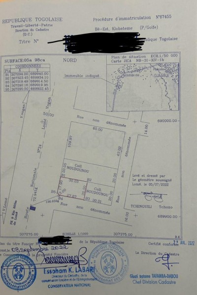 1 lot avec titre foncier au bord du goudron nationale n 34
